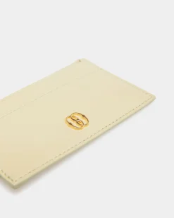 Emblem Zipped Card Holder In Light Green Leather