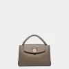 Lock Me Small Top Handle Bag In Taupe Grained Leather