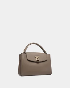 Lock Me Small Top Handle Bag In Taupe Grained Leather
