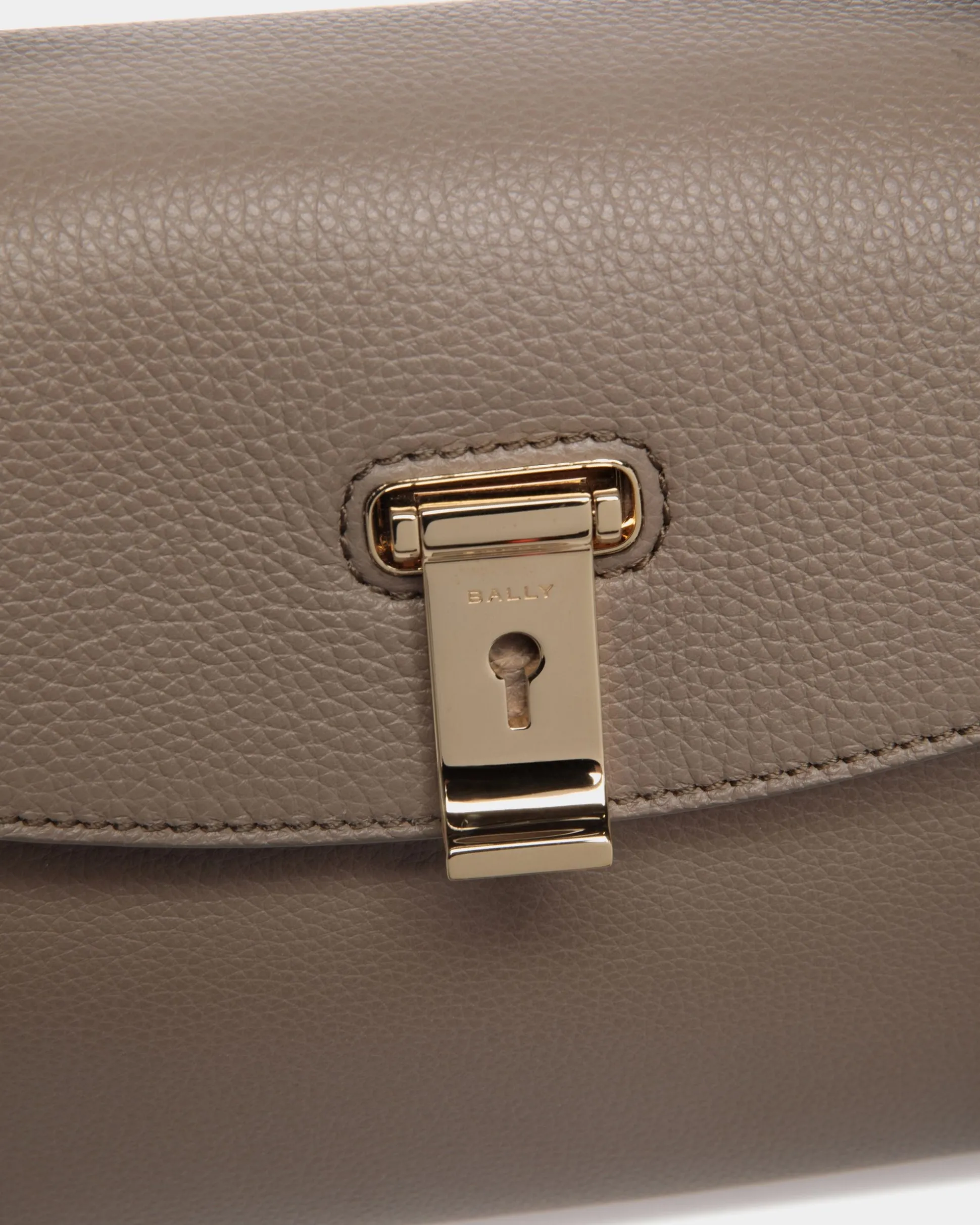 Lock Me Small Top Handle Bag In Taupe Grained Leather